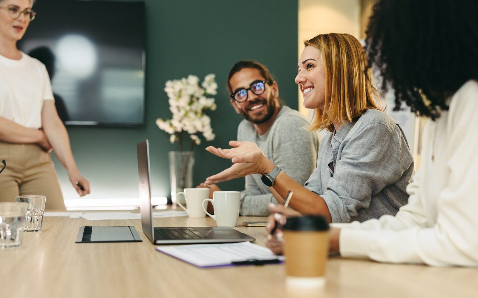 A founder and her team talking through a hiring plan